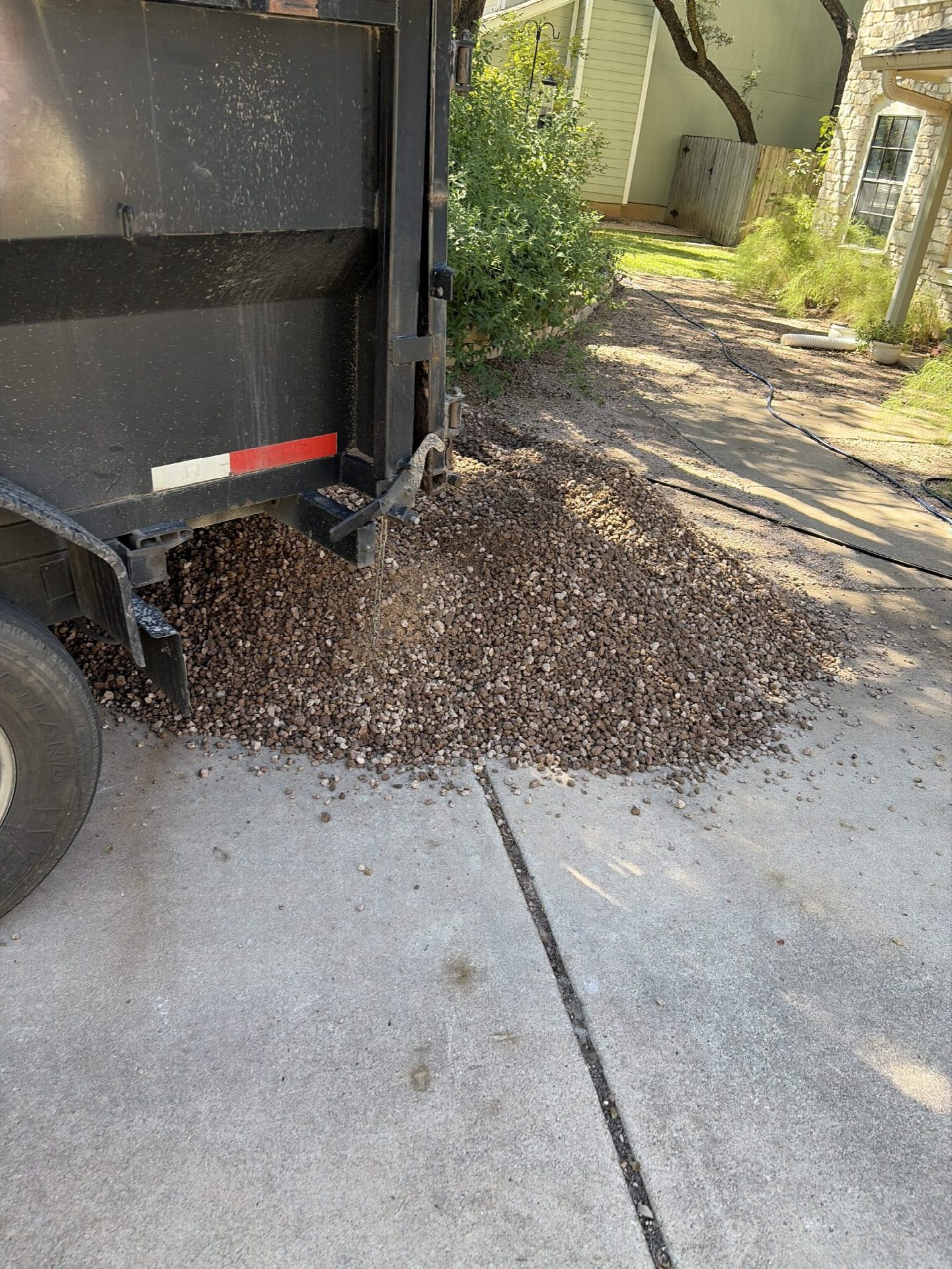 Driver's photo of 3 yards of 1/2"- 1" Fairland Pink Gravel in Austin